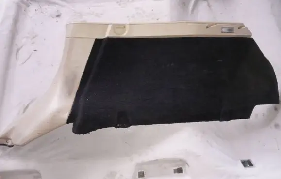 Trunk/boot lower side trim panel