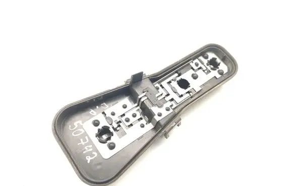 Tail light bulb cover holder