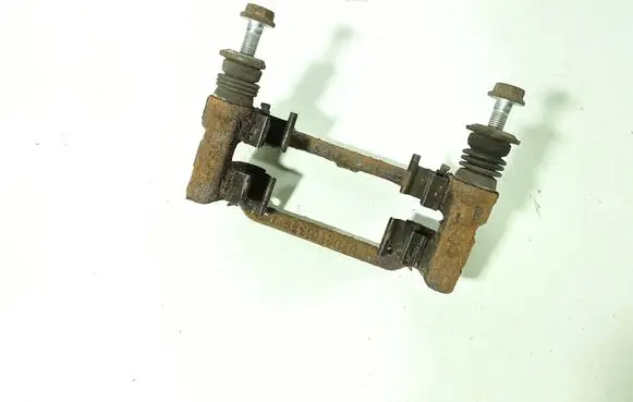 Toyota Avensis T250 Brake caliper pad carrier rear 