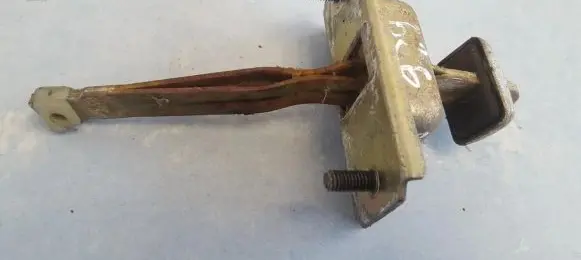 Mazda 626 Front door check strap stopper 