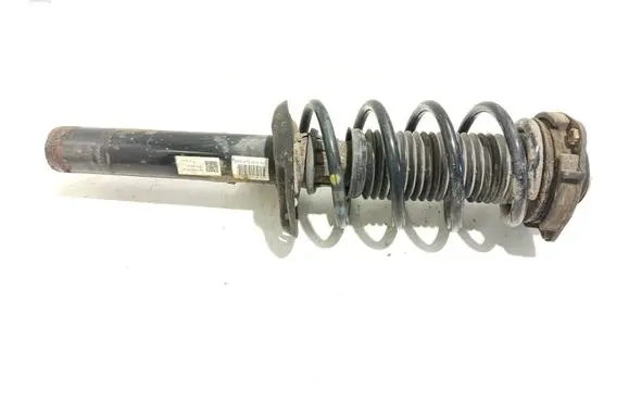 Volkswagen Caddy Front shock absorber with coil spring