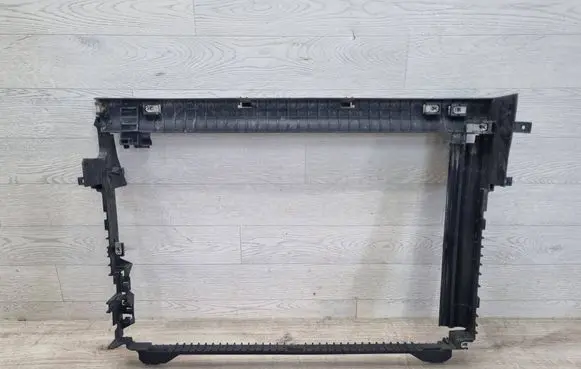 Jaguar XE Radiator mount bracket GX738B588CL