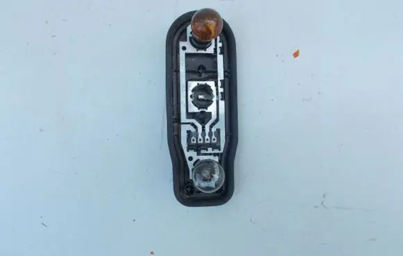 BMW 5 E39 Tail light bulb cover holder 393390 2496329 2496336