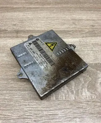 Volkswagen Touran I Headlight ballast module Xenon 1T0907391 1307329090