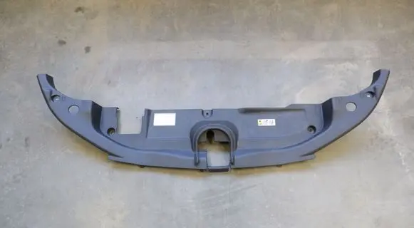 Engine bonnet/hood lock trim molding