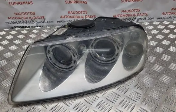 Volkswagen Touareg I Headlight/headlamp 7L6941015CF