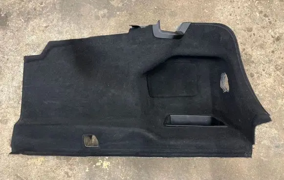 Trunk/boot lower side trim panel