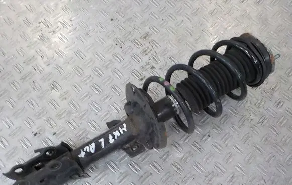 Front shock absorber with coil spring