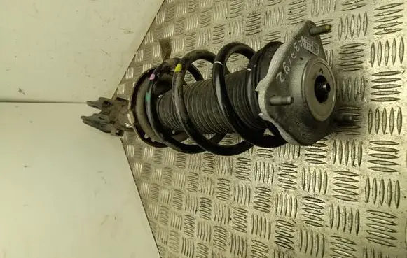 Renault Logan I Front shock absorber with coil spring 54650CV300