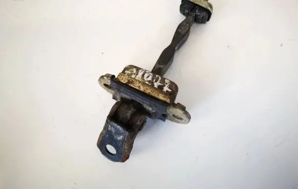 Rear door check strap stopper