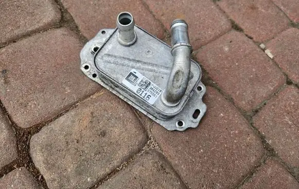Opel Astra K Engine oil radiator 55510116