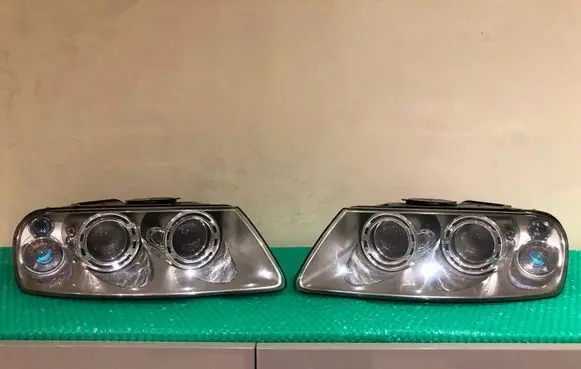 Volkswagen Touareg I Headlights/headlamps set 89307851 89307861 7L6941015BK