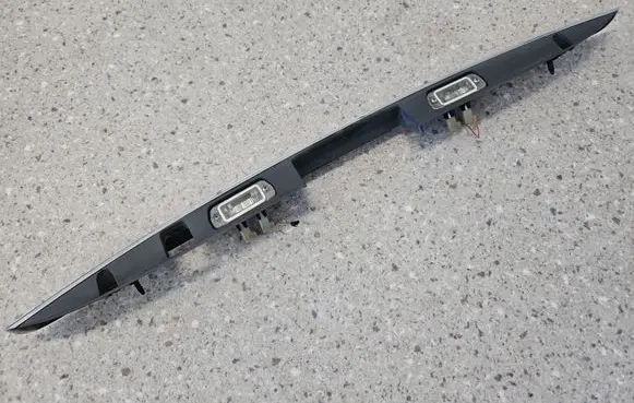 Mercedes-Benz GL X164 Trunk door license plate light bar A1647400993 1647400993