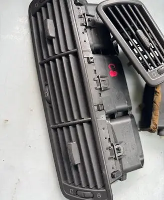 Dash center air vent grill