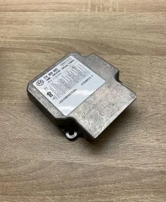 Volkswagen Touran I Airbag control unit/module 1T0909605
