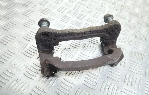 Mazda CX-7 Front Brake Caliper Pad/Carrier 