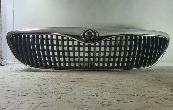 Mazda Xedos 9 Front bumper upper radiator grill T00150711
