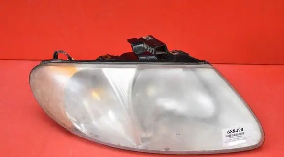 Chrysler Grand Voyager IV Headlight/headlamp 04857700AB