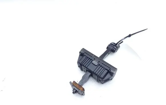 Front door check strap stopper