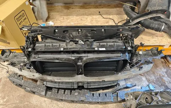 Radiator support slam panel