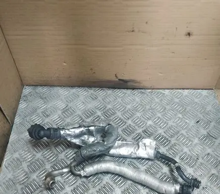 Volkswagen PASSAT B8 Engine coolant pipe/hose 06K121065R