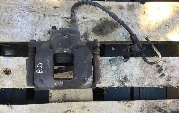 Dodge Grand Caravan Front brake caliper OEM