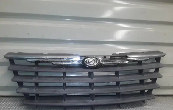 Chrysler Voyager Front bumper upper radiator grill 04857960AA