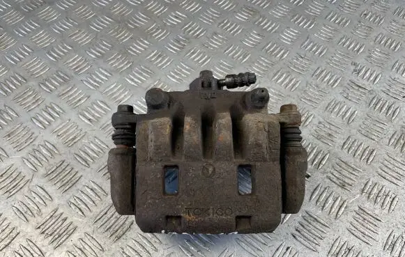 Subaru Impreza III Front brake caliper