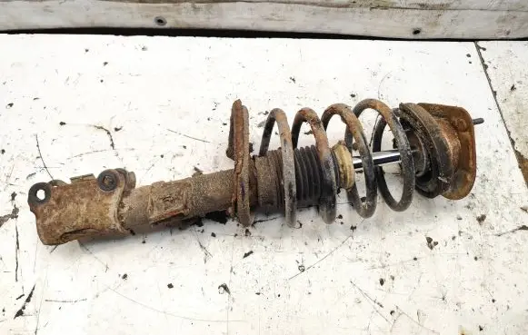 Front shock absorber with coil spring
