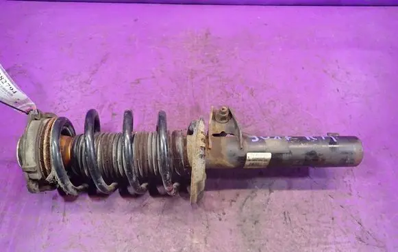 Audi A3 S3 A3 Sportback 8P Front shock absorber with coil spring 