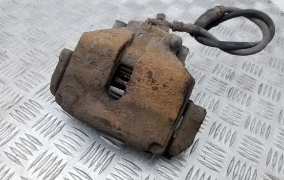 Volkswagen PASSAT B6 Front brake caliper 581