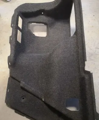 Trunk/boot lower side trim panel
