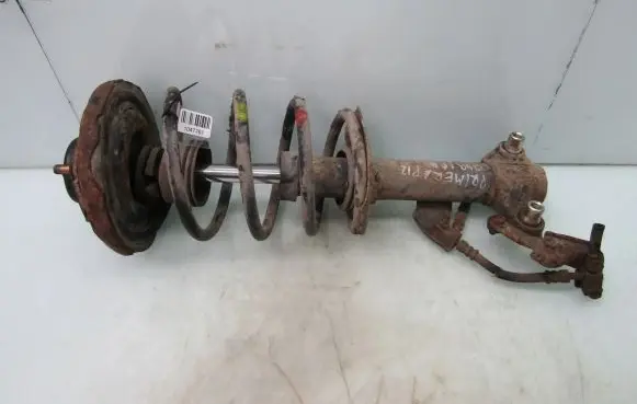 Nissan Primera Front shock absorber with coil spring