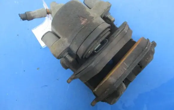 Volkswagen Golf IV Front brake caliper