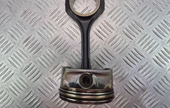 Piston with connecting rod
