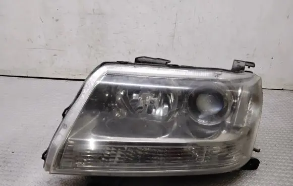 Suzuki Grand Vitara II Headlight/headlamp 10059079