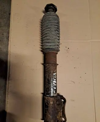Suzuki Grand Vitara I Front shock absorber/damper 4160185CA0 22119085
