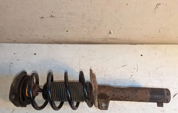 Volkswagen PASSAT CC Front shock absorber with coil spring 1T0413031
