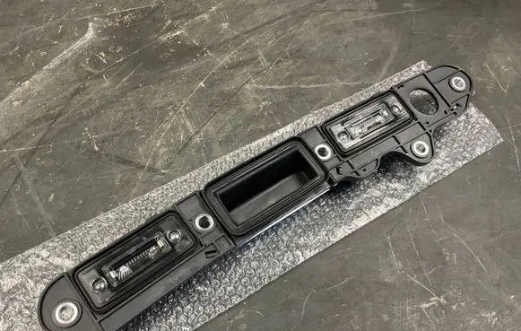 Volkswagen Jetta V Trunk door license plate light bar 1T0827574A 1T0827574L 1T0827574C