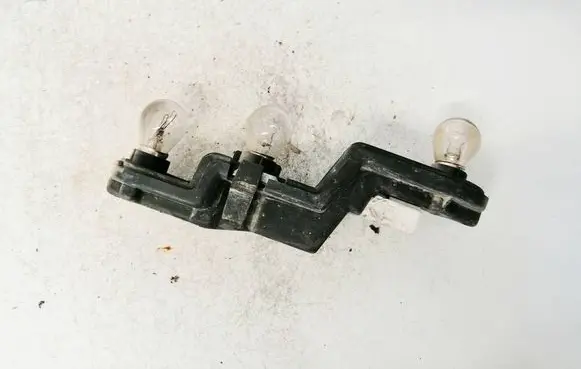 Nissan Micra Tail light bulb cover holder 