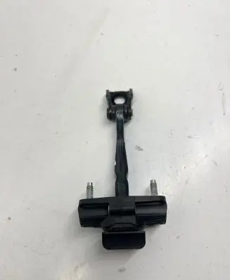 Front door check strap stopper