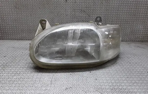 Ford Escort Headlight/headlamp E95073