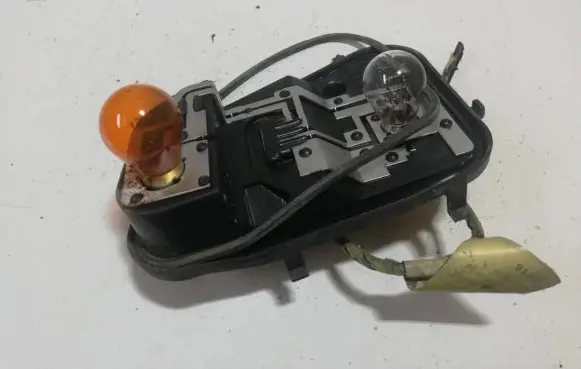 Volkswagen Touareg I Tail light bulb cover holder 7l6945258 28252202