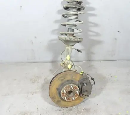 Subaru Forester SG Front shock absorber with coil spring