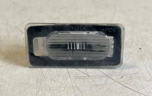 Toyota Corolla E210 E21 Number plate light FEKA02441
