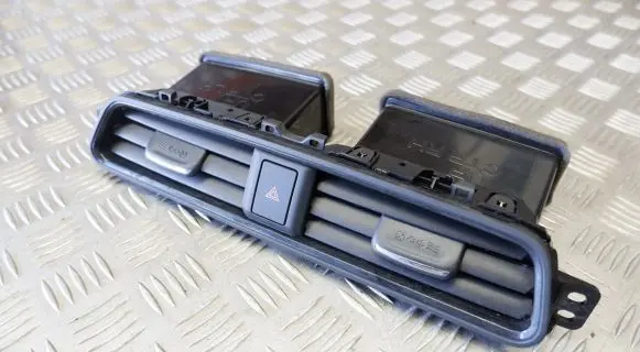 Nissan Leaf II (ZE1) Dash center air vent grill 687505SK0B