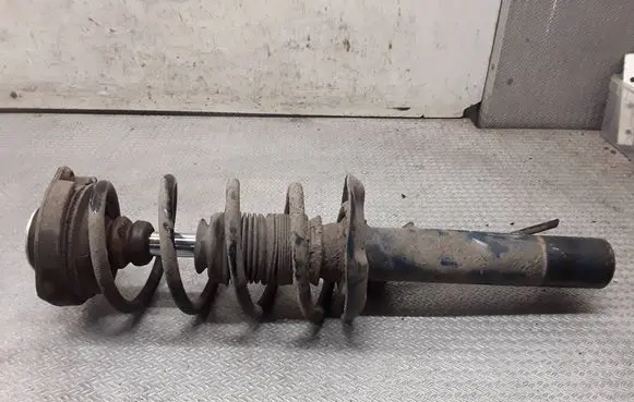 Seat Leon (1P) Front shock absorber with coil spring 