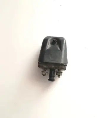 Mitsubishi Pajero Sport I Headlight washer spray nozzle