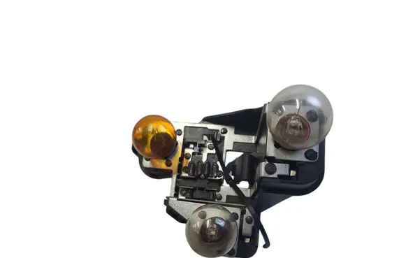 Tail light bulb cover holder