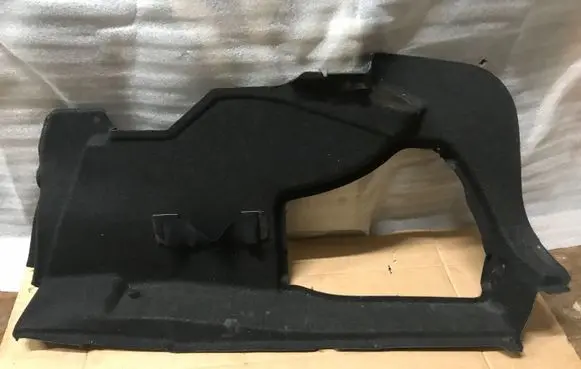 Trunk/boot lower side trim panel